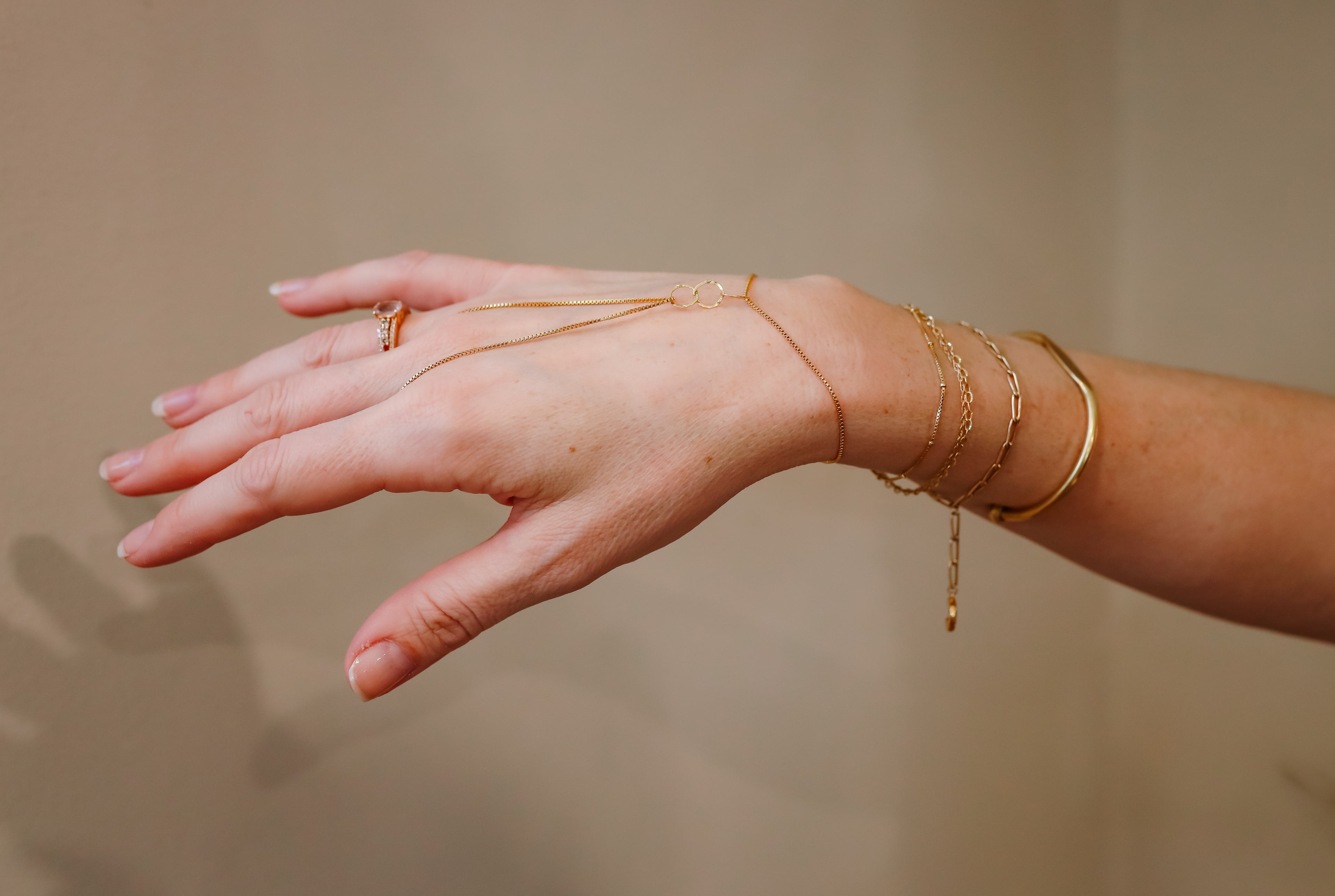 Beauty By Bria's bracelet stacks, and handchain